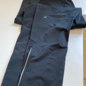 Lululemon men’s black joggers size L. Draw string, zip at ankles, snap pockets